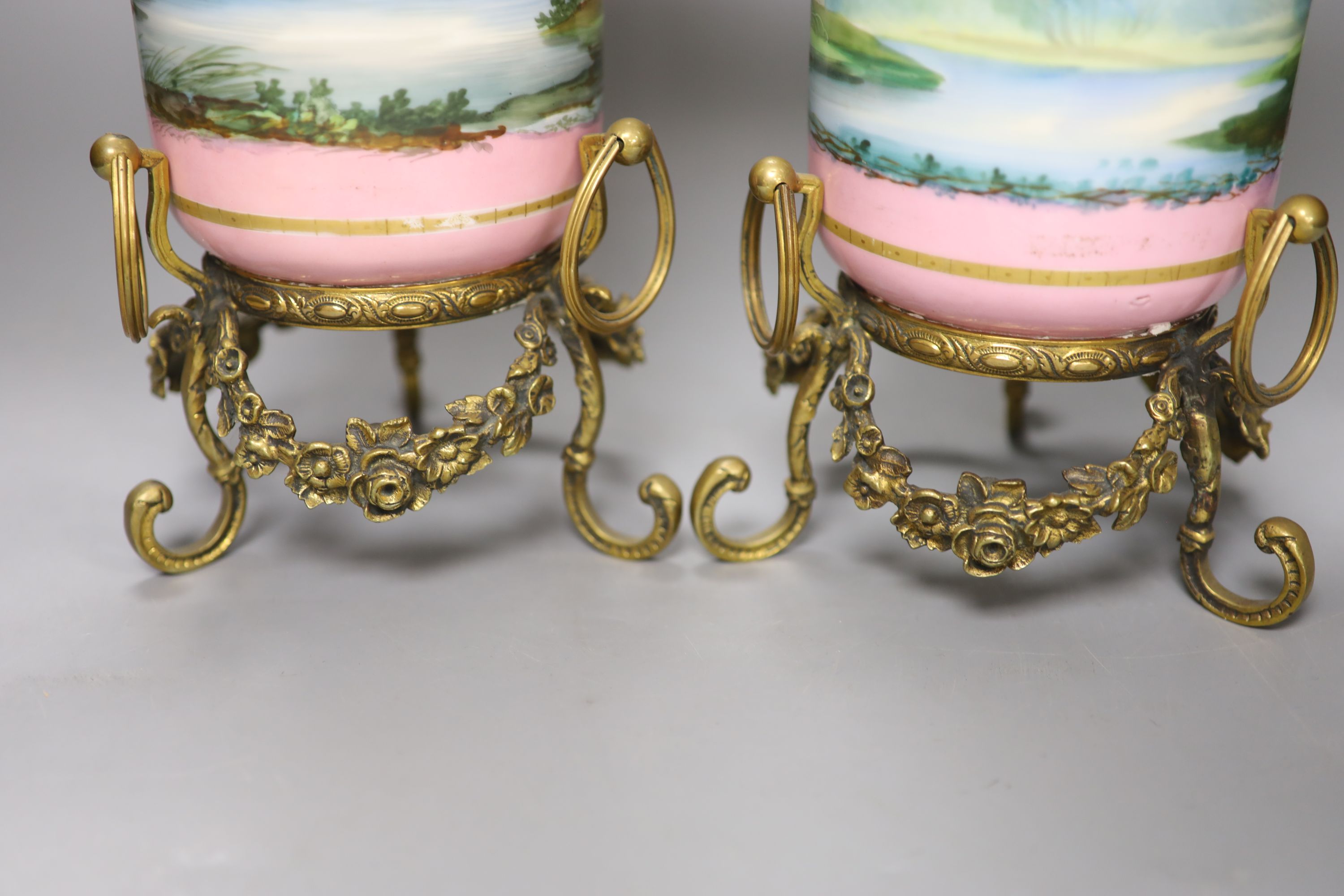 A pair of late 19th century Paris porcelain and gilt metal mounted vases, height 33cm